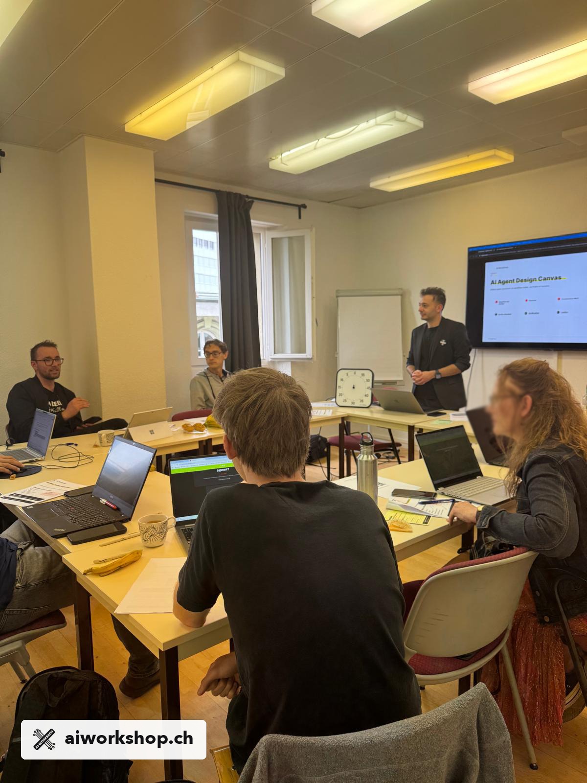 Agentic AI workshop in Lausanne with participants working around the Agent Design Canvas